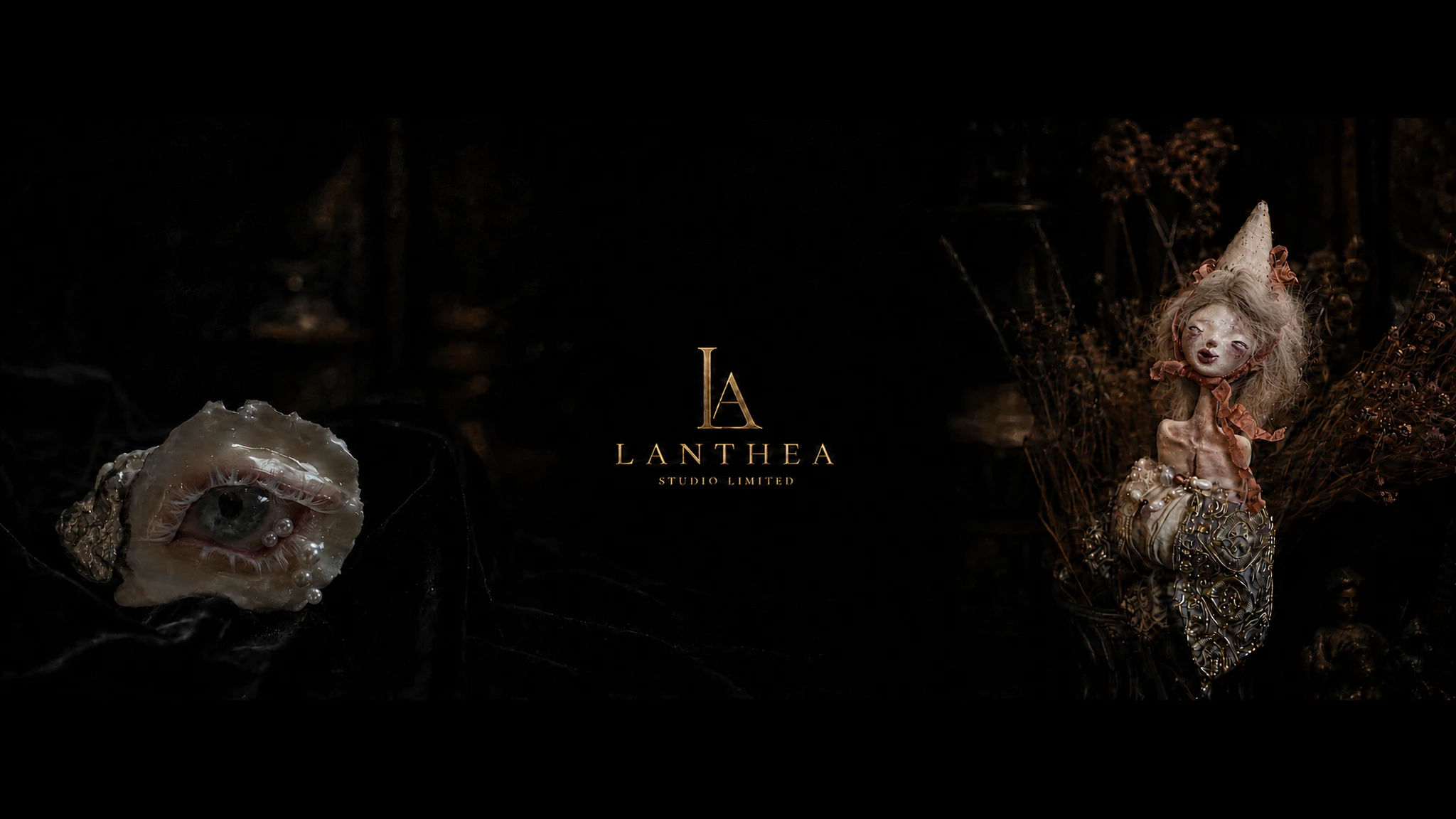 Shell Oracle’s pearl-adorned eye sculpture at left and a Lambwick doll at right, framing the golden Lanthea Studio logo.